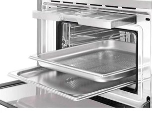 Компактный духовой шкаф с пароваркой Smeg SF4750VCBS фото 4 в Екатеринбурге