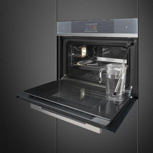 Компактный духовой шкаф с пароваркой Smeg SF4104WVCPS фото 2 в Екатеринбурге