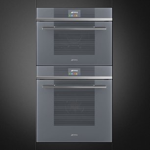 Компактный духовой шкаф с пароваркой Smeg SF4104VCS фото 4 в Екатеринбурге