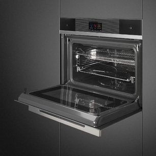 Компактный духовой шкаф с пароваркой Smeg SF4104WVCPN фото 4 в Екатеринбурге