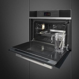 Компактный духовой шкаф с пароваркой Smeg SF4104WVCPN фото 2 в Екатеринбурге