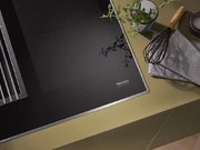 Индукционная панель со встроенной вытяжкой Miele KMDA 7774 FR фото 2 в Екатеринбурге