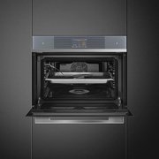 Компактный духовой шкаф с пароваркой Smeg SF4104WVCPS фото 4 в Екатеринбурге