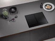 Индукционная панель конфорок с сенсорным управлением Miele KM7564 FL фото 3 в Екатеринбурге