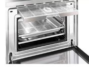 Компактный духовой шкаф с пароваркой Smeg SF4750VCBS фото 2 в Екатеринбурге